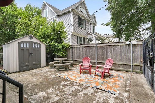 view of patio with a shed