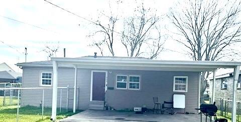 rear view of property with a patio area