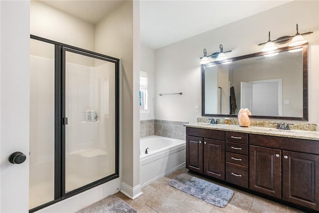 bathroom featuring tile patterned flooring, vanity, and independent shower and bath