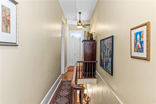 918 Orleans Ave, New Orleans, LA 70116 - corridor featuring baseboards and wood finished floors