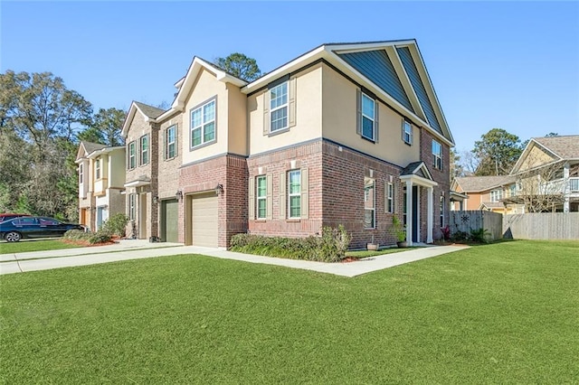 view of front of home featuring a front yard and a garage