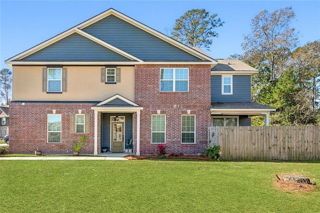 view of front of home featuring a front lawn