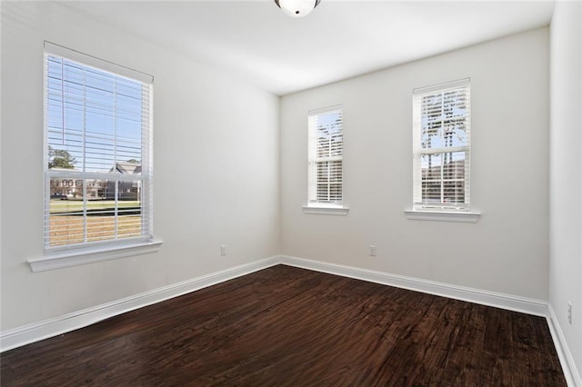 bathroom with hardwood / wood-style floors, vanity, and walk in shower