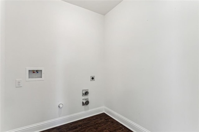 clothes washing area featuring hookup for an electric dryer, washer hookup, hardwood / wood-style flooring, and hookup for a gas dryer