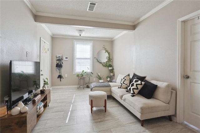 living room with a textured ceiling and crown molding