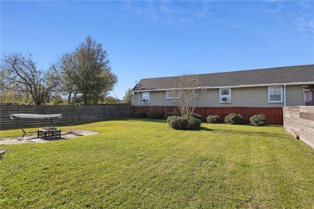 view of yard with a fire pit and a patio