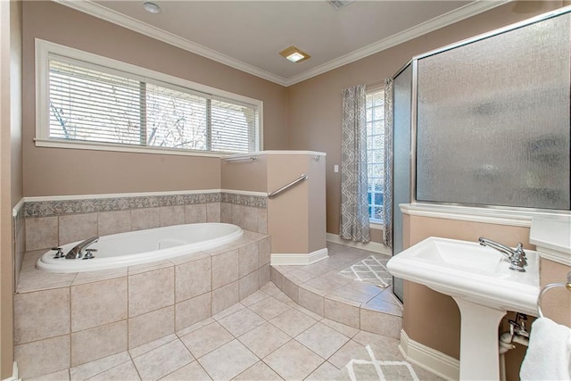 bathroom with tile patterned flooring, shower with separate bathtub, and ornamental molding