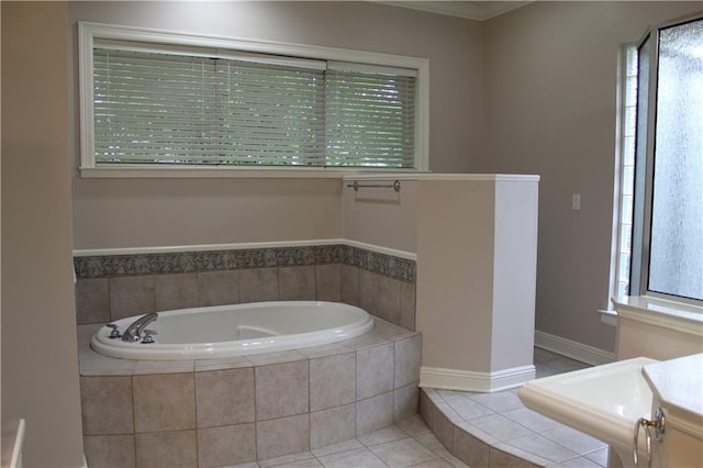 26 Pine Ln, Hammond, LA 70401 - bathroom with a garden tub, tile patterned flooring, and crown molding