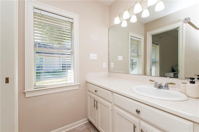 26 Pine Ln, Hammond, LA 70401 - bathroom with baseboards, tile patterned floors, and vanity