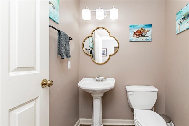 26 Pine Ln, Hammond, LA 70401 - bathroom with toilet and baseboards