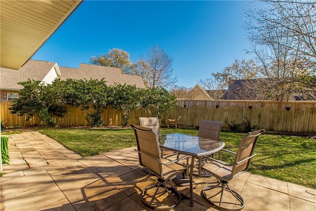 26 Pine Ln, Hammond, LA 70401 - view of patio / terrace with outdoor dining area and a fenced backyard
