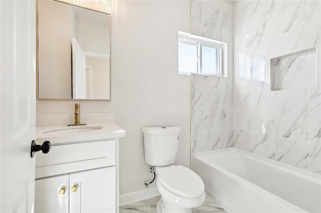 full bathroom with vanity, tiled shower / bath combo, and toilet