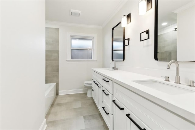 bathroom with vanity, toilet, and crown molding