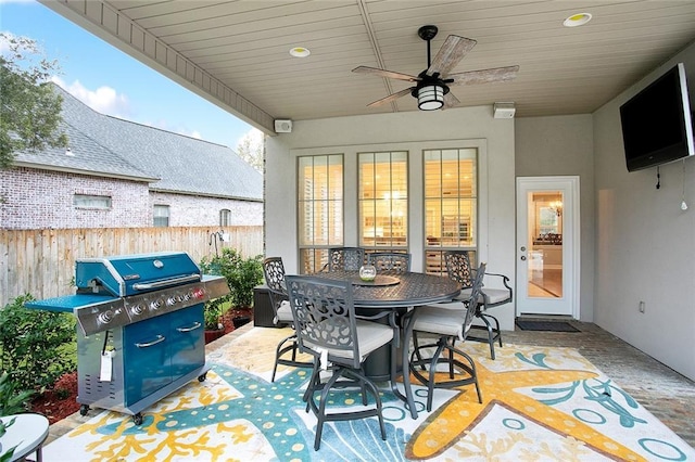 view of patio featuring grilling area and ceiling fan