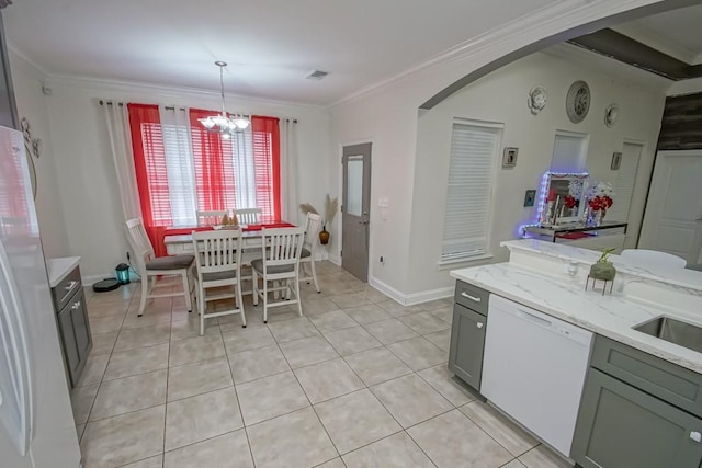 kitchen with a chandelier, white appliances, decorative light fixtures, gray cabinets, and ornamental molding