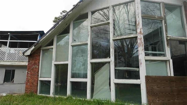 235 S Acadian Thruway, Baton Rouge, LA 70806 - view of side of property featuring a sunroom