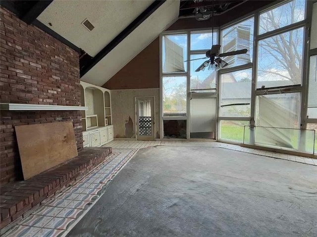 unfurnished living room featuring ceiling fan and high vaulted ceiling