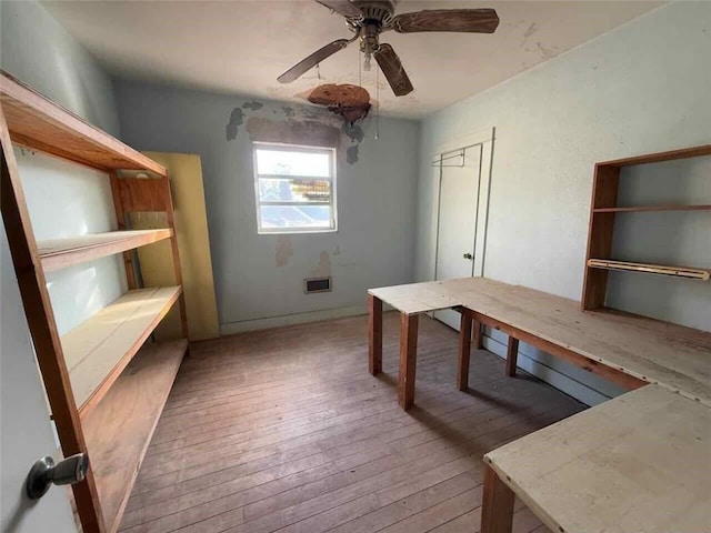 235 S Acadian Thruway, Baton Rouge, LA 70806 - unfurnished office featuring light wood-style flooring and a ceiling fan