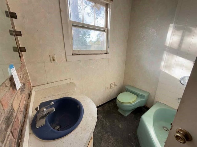235 S Acadian Thruway, Baton Rouge, LA 70806 - bathroom featuring a sink and a tub