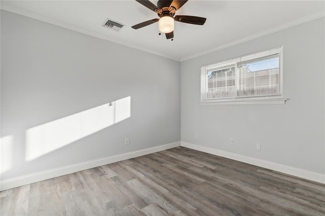 unfurnished room with ceiling fan, crown molding, and wood-type flooring