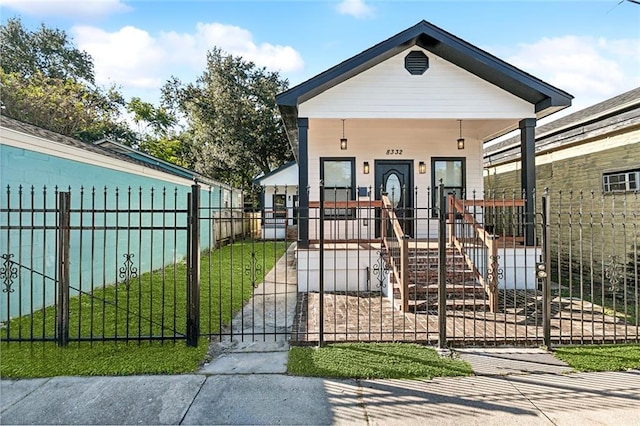 bungalow-style home featuring covered porch