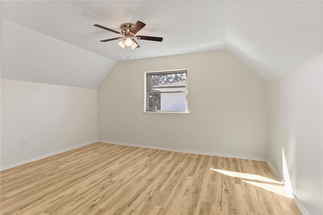 bonus room featuring ceiling fan, lofted ceiling, and light hardwood / wood-style flooring