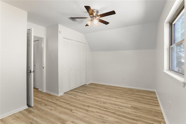 bonus room featuring light wood-type flooring, ceiling fan, and lofted ceiling