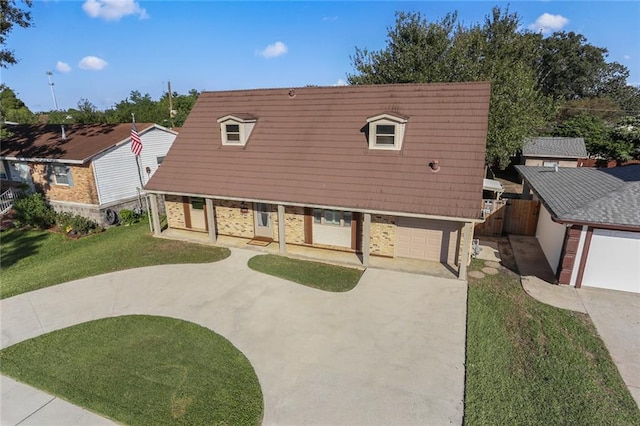 view of front of home with a front yard and a porch