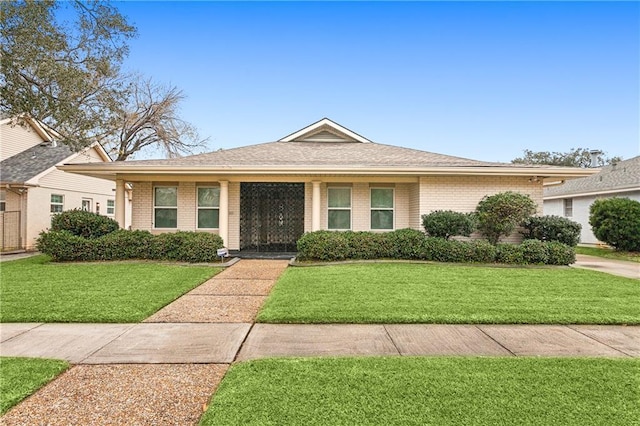 view of front of home with a front yard