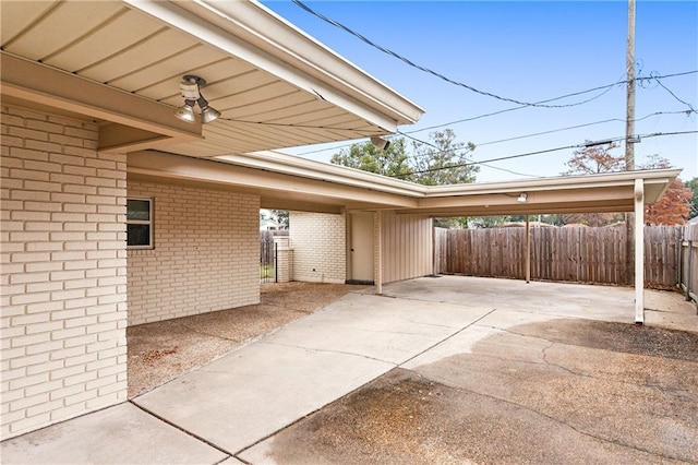 view of patio featuring a carport