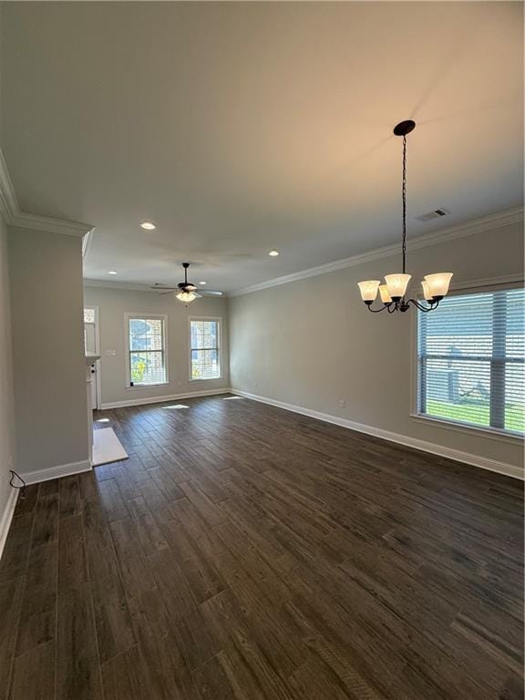 interior space featuring ceiling fan with notable chandelier, ornamental molding, and dark hardwood / wood-style floors