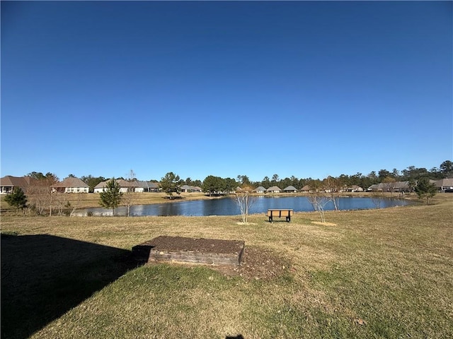 view of yard with a water view