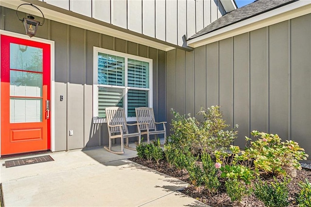 view of exterior entry featuring a patio