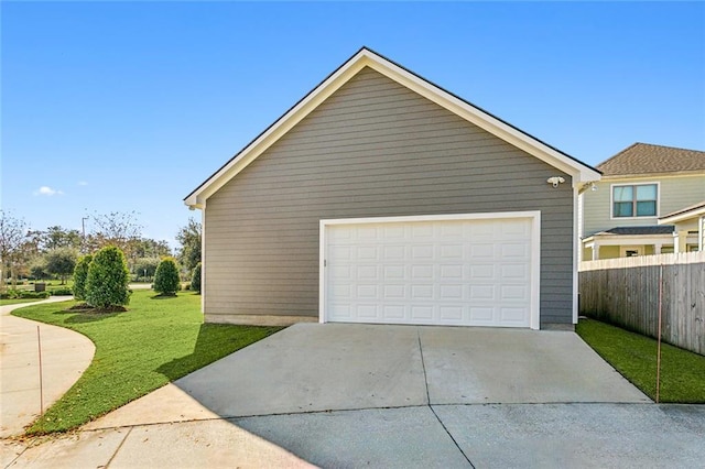 garage featuring a yard