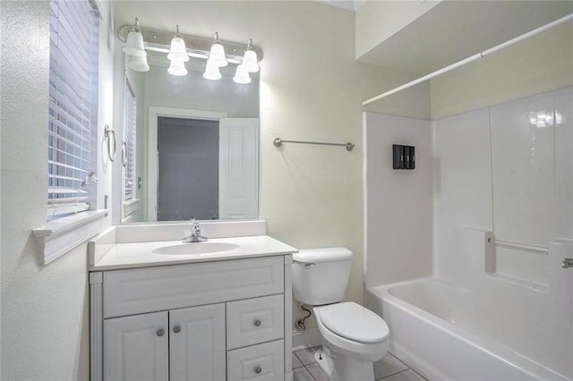 full bathroom featuring tile patterned floors, shower / bathing tub combination, vanity, and toilet