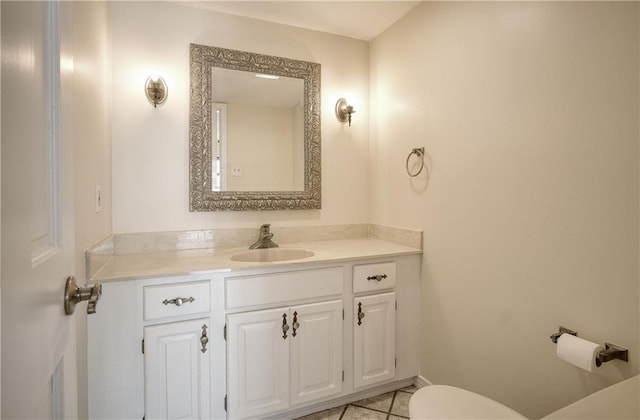 bathroom with vanity and tile patterned floors