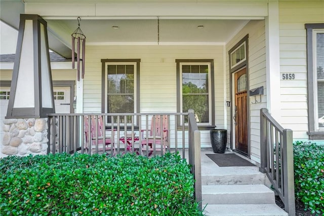 doorway to property with covered porch