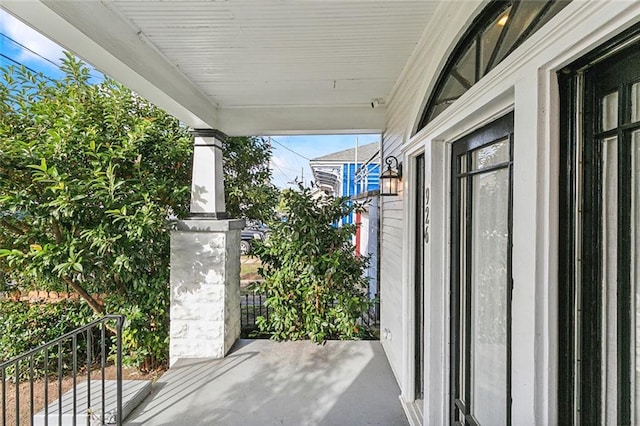 view of patio featuring a porch