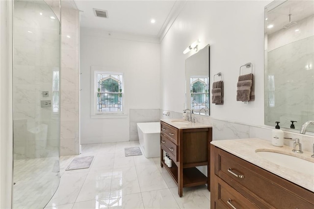 bathroom featuring shower with separate bathtub, vanity, ornamental molding, and a healthy amount of sunlight