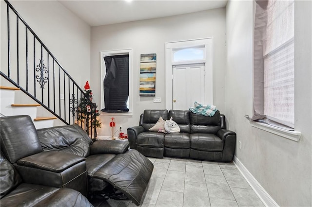 living room with light tile patterned flooring