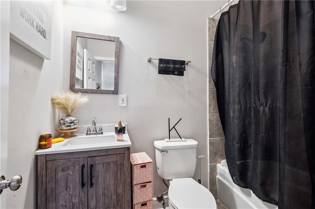 full bathroom featuring vanity, toilet, and shower / bathtub combination with curtain