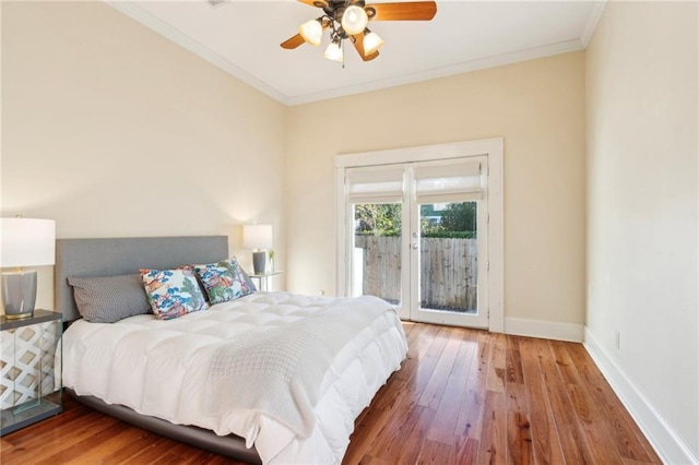 bedroom featuring access to outside, ceiling fan, ornamental molding, and hardwood / wood-style flooring