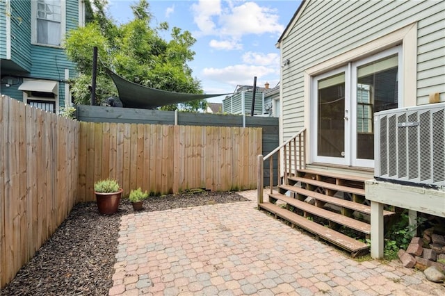 view of patio / terrace with central AC unit