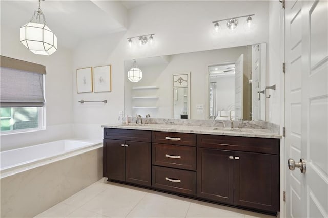 bathroom with vanity, tile patterned flooring, and plus walk in shower