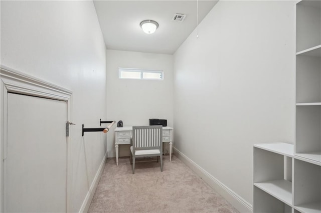 living area with light carpet