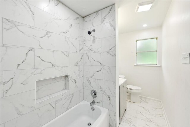 309 W Joan St, Gonzales, LA 70737 - full bathroom featuring toilet, vanity, and tiled shower / bath