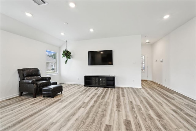 sitting room with light hardwood / wood-style flooring