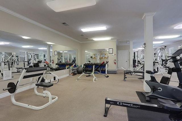 workout area with carpet flooring and crown molding