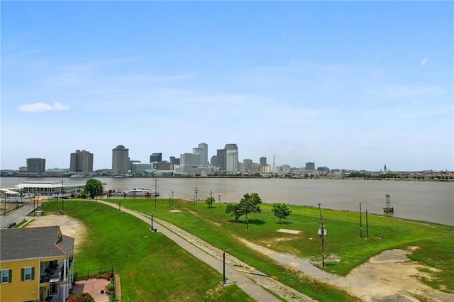 surrounding community featuring a water view