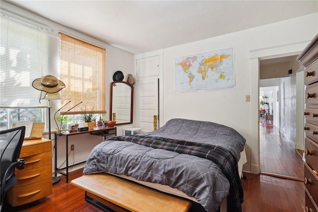 bedroom featuring dark wood-style floors